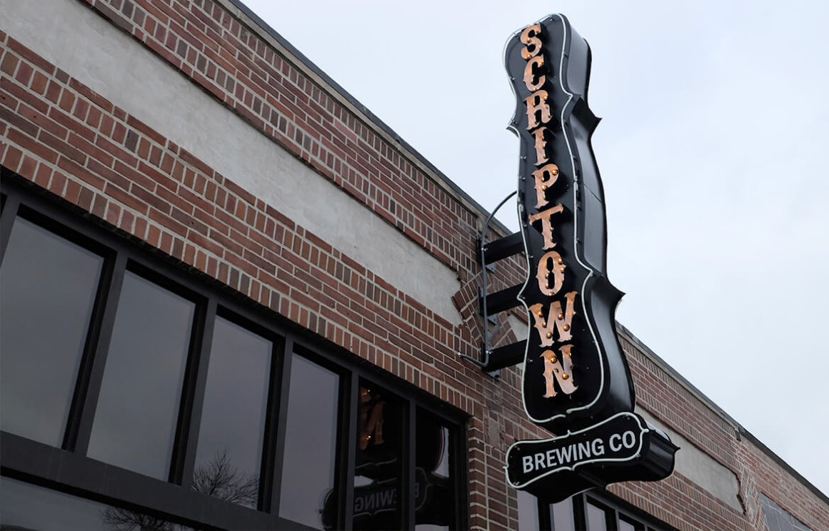 Scriptown Omaha Bar Construction Signage